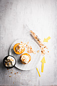 Nectarines with cream and almond flakes