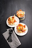 Gamba prawns in toast bowls with fried eggs