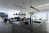 Designer-style open-plan interior with elegant kitchen counter