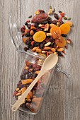 Dried fruit and nuts in storage jar