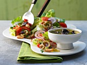 Greek squid salad with cucumber and peppers