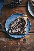 Crepes drizzled with chocolate and ground almonds
