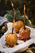 Caramel apples with chopped pistachios