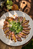 Duck breast with apple and watercress