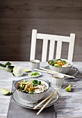 Basmati rice with vegetables on grey background