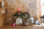 Advent arrangement of candle and wooden star on vintage kitchen scales