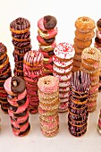 Different doughnut varieties stacked in towers