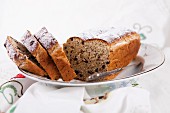 Easter bread with currants and pecans, sliced on a plate