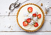 Lime pie with strawberries and meringue