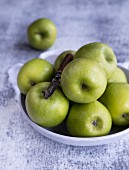 Green apples in a bowl
