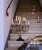 Candle lanterns and candelabra on staircase