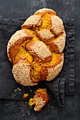 Plaited mustard bread with sesame seeds
