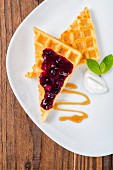 Waffles with berry jam (top view)