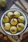 Pears in a metal bowl