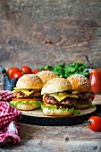 Homemade burgers with pickled cucumbers