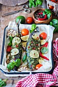 Roasted mackerel with garlic, lime, chilli pepper and basil