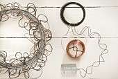 Arrangement of cables and copper wire on white surface