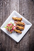 Fried pheasant fillets with salad