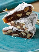A pile of Panforte slices on a plate