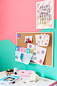 Bicoloured walls in mint and pink in child's bedroom