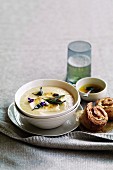 Roast garlic and parsnip soup with lemon and sage butter