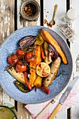 Oven roasted vegetables with sausages