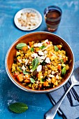 Oriental rice with vegetables, almonds and raisins