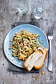 Scrambled eggs with prawns and dill