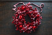 Christmas wreath of red berries and apples