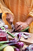 Chopping red onion and vegetables