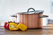 A copper, aluminium and stainless steel saucepan made by Schulte-Ufer