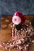 Bouquet of ranunculus on lace cloth