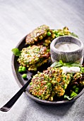 Pea and spinach fritters with ricotta and a herb yoghurt dip