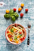 Zoodles (zucchini noodles) with tomatoes and basil