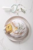'Vasilopita' (Greek New Year cake with a coin hidden inside it), with a slice cut out