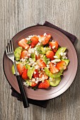 Avocado salad with strawberries and crab meat