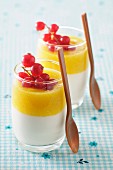 Panna cotta with mango and red currants