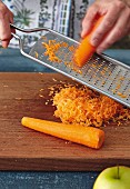 Carrots being grated