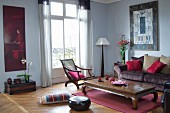 Oriental furniture in living room in shades of red