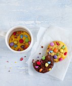 Cupcake with colourful sugar coated chocolates
