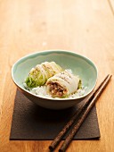 Cabbage rolls filled with mince on rice (Asia)
