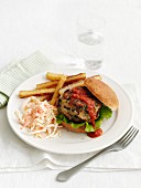 A beanburger with french fries and coleslaw (Cajun cuisine)