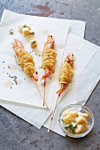 Crispy shrimp skewers wrapped in potato