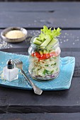 Couscous tabouleh in a glass jar