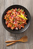 Tomato salsa with red onions