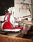 Parma ham being sliced in a machine