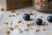 Cereal and blueberries on a wooden background