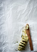 Herb butter with a wooden knife