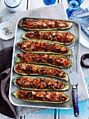 Stuffed courgettes in a baking dish