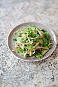 Edamame pasta with zucchini, beans, peas and fresh herbs
